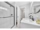 Modern bathroom with glass shower, white vanity, and new fixtures at 1893 Burning Tree Dr, Decatur, GA 30032