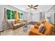 Bright living room with modern decor and a large window at 1893 Burning Tree Dr, Decatur, GA 30032