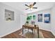 Charming office space featuring hardwood floors, a ceiling fan, and natural light at 1893 Burning Tree Dr, Decatur, GA 30032