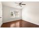 Bright bedroom with hardwood floors, a ceiling fan, and a window at 380 Grant Se Cir # 306, Atlanta, GA 30315