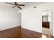 Spacious bedroom with a ceiling fan and an open door to the bathroom at 380 Grant Se Cir # 306, Atlanta, GA 30315
