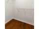 Walk-in closet with hardwood floors and wire shelving at 380 Grant Se Cir # 306, Atlanta, GA 30315