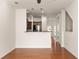 The kitchen overlooks a living area creating an open concept space with sleek countertops and stainless appliances at 380 Grant Se Cir # 306, Atlanta, GA 30315