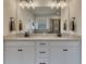 Bathroom featuring double sinks, vanity, and a large mirror at 4732 Cooling Water Cir, Powder Springs, GA 30127