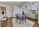 Kitchen and dining area with seating for six people and stainless appliances at 4732 Cooling Water Cir, Powder Springs, GA 30127