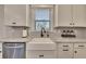 Charming kitchen featuring a farmhouse sink, granite countertops, and white cabinets at 4732 Cooling Water Cir, Powder Springs, GA 30127