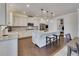 Open kitchen with large island, stainless steel appliances, and breakfast bar seating at 4732 Cooling Water Cir, Powder Springs, GA 30127