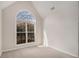 Bedroom featuring plush carpet, a vaulted ceiling, and lots of natural light at 109 Melrose Creek Dr, Stockbridge, GA 30281
