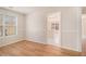 Bright dining area with hardwood floors and view into kitchen space at 109 Melrose Creek Dr, Stockbridge, GA 30281