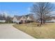 Lovely home with a long driveway and well-maintained lawn at 109 Melrose Creek Dr, Stockbridge, GA 30281