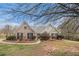 Charming brick home with manicured landscaping and inviting front entrance at 109 Melrose Creek Dr, Stockbridge, GA 30281