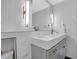 Elegant bathroom with modern vanity, stylish fixtures, and recessed shelving at 1101 Juniper Ne St # 519, Atlanta, GA 30309