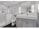 Modern bathroom featuring white marble, a frameless glass shower, and stylish vanity at 1101 Juniper Ne St # 519, Atlanta, GA 30309