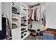 Walk-in closet with custom shelving offering ample storage for clothes and accessories at 1101 Juniper Ne St # 519, Atlanta, GA 30309