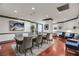 Elegant resident dining area with a large table, stylish chairs, and contemporary artwork at 1101 Juniper Ne St # 519, Atlanta, GA 30309