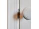 An interior door showcasing a cracked, ceramic doorknob and aged patina at 1101 Juniper Ne St # 519, Atlanta, GA 30309