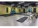 Gym space with a punching bag, weights, mirrors, and black ceilings at 1101 Juniper Ne St # 519, Atlanta, GA 30309