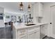 Kitchen with quartz countertop island, stainless steel dishwasher, and modern lighting at 1101 Juniper Ne St # 519, Atlanta, GA 30309