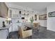 Eat-in kitchen with bright white cabinets and island and modern, stylish décor at 1101 Juniper Ne St # 519, Atlanta, GA 30309