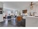 Bright living room featuring an open floorplan with modern decor, large windows, and stylish furnishings at 1101 Juniper Ne St # 519, Atlanta, GA 30309