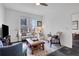 Open living area featuring natural light, comfortable furnishings and contemporary decor at 1101 Juniper Ne St # 519, Atlanta, GA 30309