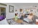 Living room view showcasing contemporary furnishings and adjacent kitchen space at 1101 Juniper Ne St # 519, Atlanta, GA 30309