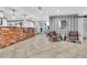 Well-decorated lobby area with a wooden desk, comfortable seating, and elegant lighting at 1101 Juniper Ne St # 519, Atlanta, GA 30309