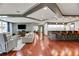 Large resident lounge with a full kitchen and comfortable seating areas at 1101 Juniper Ne St # 519, Atlanta, GA 30309