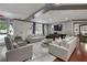 Spacious resident lounge featuring hardwood floors, comfortable couches and stylish decor at 1101 Juniper Ne St # 519, Atlanta, GA 30309