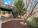 Backyard with a lower patio, second story deck, and mature landscaping at 2536 Kachina Trl, Dacula, GA 30019