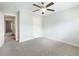 Spacious bedroom with neutral carpet and a ceiling fan at 2536 Kachina Trl, Dacula, GA 30019