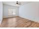 Spacious bedroom with large window providing natural light and wood-look flooring at 2536 Kachina Trl, Dacula, GA 30019