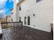 Deck with dark wood floor and railing offers outdoor enjoyment and entertainment space at 2536 Kachina Trl, Dacula, GA 30019