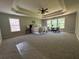 Expansive main bedroom boasting generous natural light from large windows and finished with modern ceiling fan at 2536 Kachina Trl, Dacula, GA 30019