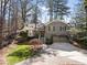 Charming two-story home featuring a well-manicured front yard and a two-car garage at 2630 Orchard Knob Se, Atlanta, GA 30339