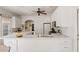 Spacious white kitchen with eat in island and stainless steel appliances at 2630 Orchard Knob Se, Atlanta, GA 30339