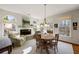 Comfortable living room with fireplace and lots of natural light from the big windows at 2630 Orchard Knob Se, Atlanta, GA 30339