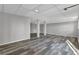 Finished basement with stylish flooring, support columns, and recessed lights at 4701 Flat Shoals Rd # 49C, Union City, GA 30291