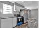 Kitchen featuring stainless appliances, granite counters and gray plank flooring at 4701 Flat Shoals Rd # 49C, Union City, GA 30291