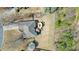 Overhead image showcasing the backyard with a deck, fire pit area and a spacious yard at 1090 Compton Way, Suwanee, GA 30024