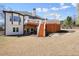 The backyard has an upper deck, stairs, and plenty of space at 1090 Compton Way, Suwanee, GA 30024
