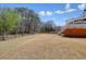 Expansive backyard featuring an upper deck and mature trees at 1090 Compton Way, Suwanee, GA 30024