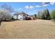 Spacious backyard with mature trees, deck and privacy fencing at 1090 Compton Way, Suwanee, GA 30024