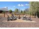 Inviting backyard fire pit area with Adirondack chairs, perfect for cozy outdoor gatherings and relaxing at 1090 Compton Way, Suwanee, GA 30024