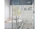 Bathroom featuring a soaking tub and a glass enclosed shower with white tiled walls at 1090 Compton Way, Suwanee, GA 30024