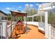 Inviting outdoor deck space featuring a built-in grill, a pergola, and ample seating for entertaining at 1090 Compton Way, Suwanee, GA 30024