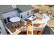 Open-air deck and dining area featuring a grill, white railings, and an umbrella-covered table at 1090 Compton Way, Suwanee, GA 30024