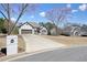Beautiful home featuring a brick exterior, a two-car garage, and a large, sloping front yard at 1090 Compton Way, Suwanee, GA 30024