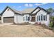 Charming one-story brick home featuring a two-car garage and well-manicured lawn at 1090 Compton Way, Suwanee, GA 30024