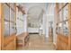 Inviting foyer with wood floors, open archways, and a glimpse into the living room at 1090 Compton Way, Suwanee, GA 30024